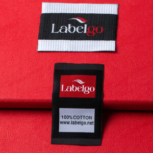 Close-up of a woven label with LabelGo logo on textile background.